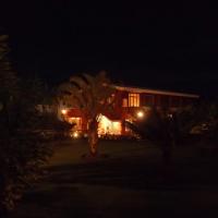 maison vue jardin nuit
